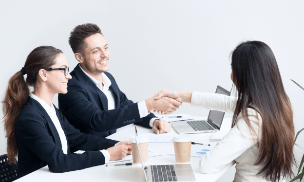 friendly-partners-handshaking-group-meeting-thanking-successful-teamwork 1-min